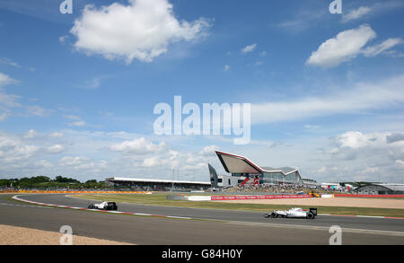 Motor Racing - Formula One World Championship - 2015 British Grand Prix - Silverstone Circuit. Williams Felipe Massa and Valtteri Bottas during the 2015 British Grand Prix at Silverstone Circuit, Towcester. Stock Photo