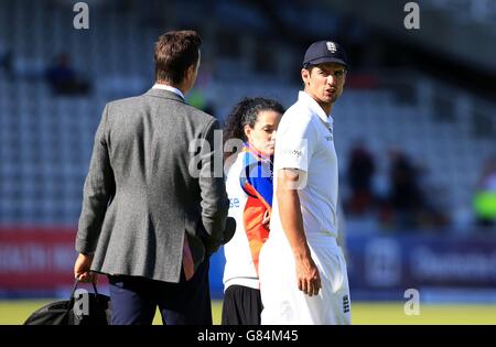 England's captain Alastair Cook, (right) chats with former captain Michael Vaughan, (left) after the match during day four of the Second Investec Ashes Test at Lord's, London. Stock Photo