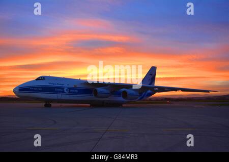 Burning sky backing an Antonov An124 Stock Photo