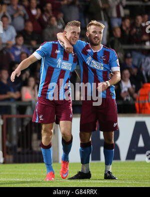 Soccer - Pre Season Friendly - Scunthorpe United v Sheffield Wednesday - Glanford Park. Scunthorpe United's Kevin van Veen (left) celebrates scoring his sides third goal of the game with team-mate Paddy Madden Stock Photo