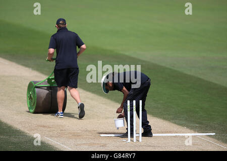 Cricket - LV= County Championship - Division Two - Day Three - Surrey v Gloucestershire - The Kia Oval. The lines of the crease are painted during a break in play. Stock Photo