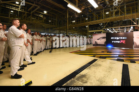 Workers at Honda of the UK Manufacturing Ltd's factory in Swindon await the arrival off the production line of the new Civic Type R Stock Photo