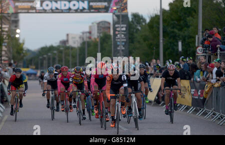 Cyclists compete in the Red Hook Criterium men's race at Greenwich Peninsula in London. Stock Photo