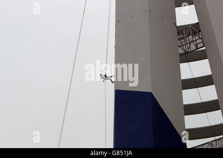 101-year-old Doris Long as she abseils down the Spinnaker Tower in Portsmouth, Hampshire. Stock Photo