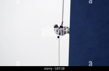 101-year-old Doris Long as she abseils down the Spinnaker Tower in Portsmouth, Hampshire. Stock Photo