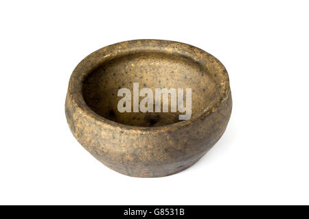 Empty rustic clay bowl isolated on white background Stock Photo