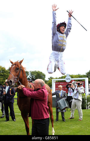 Jockey Frankie Dettori celebrates after his winning ride on Galileo Gold in the Qatar Vintage Stakes during day one of the Glorious Goodwood Festival, Chichester. Stock Photo