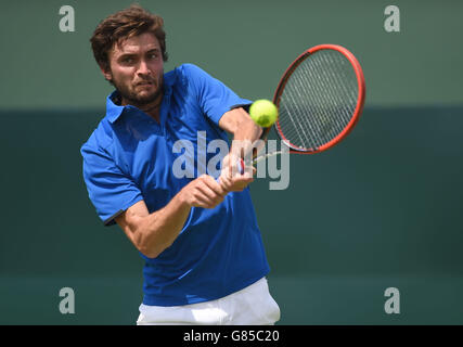 France's Gilles Simon in action during day one of the Davis Cup Quarter Finals between Great Britain and France at the Queen's Club, London. Stock Photo