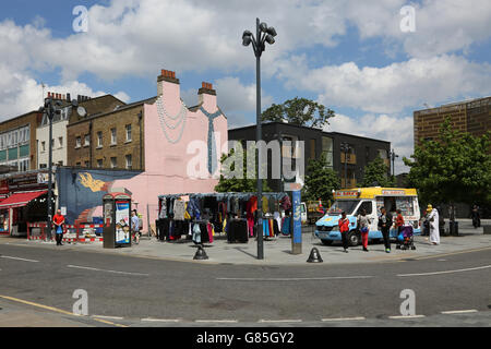 Market square on Deptford High Street in southeast London. Shows new pedestrian area with stalls, ice cream van and mural, Stock Photo