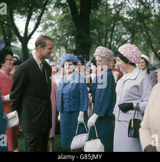 The Duke of Edinburgh talking to guests at the garden party in the grounds of the Royal Hospital, Chelsea, in connection with the 50th anniversary celebrations of the women's services. Stock Photo