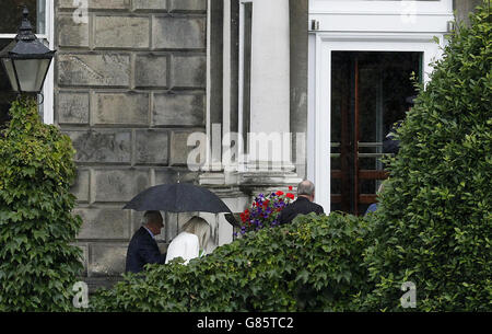 Former taoiseach Bertie Ahern (left) arrives at Leinster House, Dublin, to appear before the Oireachtas Banking Inquiry. Stock Photo