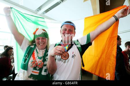 Special Olympics Team Ireland athlete David Carrig, with his sister Lisa Kelly, arrives back at Dublin Airport, having represented Ireland in the 2015 Special Olympics in Los Angeles. Stock Photo