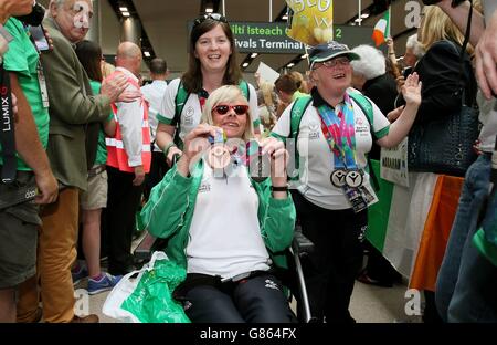 Team Ireland Special Olympics Homecoming. Special Olympics Team Ireland athletes arrive back at Dublin Airport, having represented Ireland in the 2015 Special Olympics in Los Angeles. Stock Photo