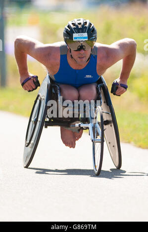 Neil Malcolm competes in the Para Tri Elite race during the Para Tri Series at Dorney Lake, Windsor. Stock Photo