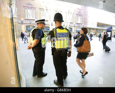 British Transport Police at King's Cross station, London, after a 63-year-old man received cuts to his body and face at Finsbury Park Tube station. PRESS ASSOCIATION Photo. Picture date: Tuesday August 11, 2015. British Transport Police (BTP) were called to Finsbury Park Underground in North London shortly before 2pm after a man was attacked on the southbound Victoria line platform. The service was later halted to allow armed police to board and search a carriage at King's Cross St Pancras Underground station. See PA story POLICE Tube. Photo credit should read: Yui Mok/PA Wire Stock Photo