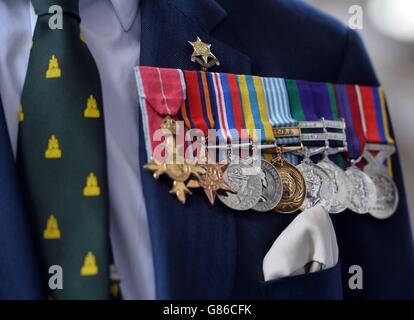 A selection of Campaign Awards are worn by a guest at St Martin-in-the-fields service of commemoration in London marking the 70th anniversary of VJ Day. Stock Photo