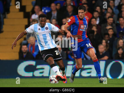 Shrewsbury's Jean-Louis Akpa Akpro, (left) battle for the ball with Crystal Palace's Martin Kelly, (right) during the Capital One Cup, second round match at Selhurst Park, London.