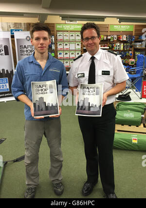 Angus Miller (left), manager of the Cotswold store in Belfast city centre, with Temporary Assistant Chief Constable Chris Noble at the launch of the Police Service of Northern Ireland Safe Shop Scheme. Stock Photo