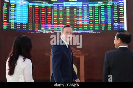 Prime Minister David Cameron arrives at the Stock Exchange in Ho Chi Minh City after becoming the first British leader to visit Vietnam. Stock Photo