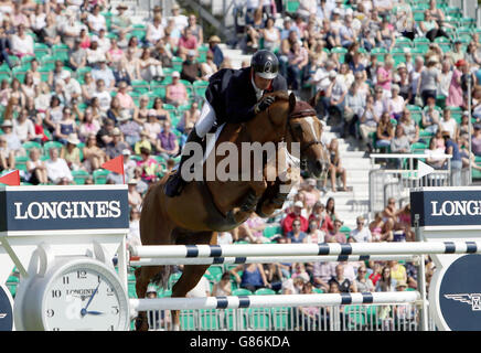 Great Britain's Guy Williams riding Titus competes in the Furusiyya FEI Nations Cup of Great Britain presented by Longines during day four of the Longines Royal International Horse Show at Hickstead, West Sussex. Stock Photo