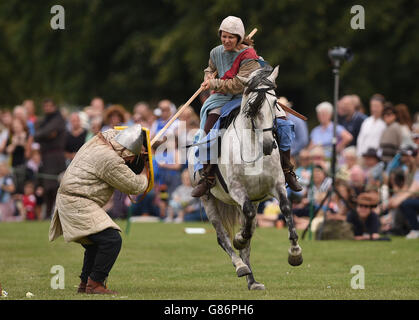 750th Anniversary of the Battle of Evesham. Re-enactors display their equestrian skills as they play out the Battle of Evesham at Abbey Park in Evesham. Stock Photo