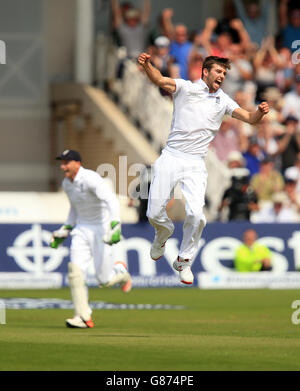 England bowler Mark Wood celebrates bowling Australia batsman Nathan Lyon to win the 4th test match and the Ashes during day three of the Fourth Investec Ashes Test at Trent Bridge, Nottingham. Stock Photo