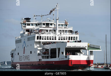 A Red Funnel Car Ferry makes it's way into the Cowes Harbour Stock Photo