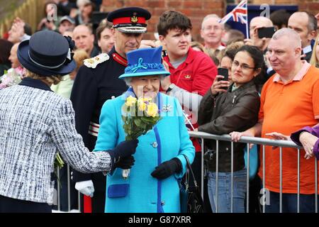 Queen Elizabeth II greets well-wishers as she opens Newton Grange railway station, on the day she becomes Britain's longest reigning monarch, as she and her husband, the Duke of Edinburgh, travel on a steam train to inaugurate the new &pound;294 million Scottish Borders Railway. Stock Photo