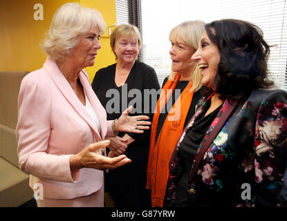 The Duchess of Cornwall meets (left to right) Pauline Quirke, Linda Robson and Lesley Joseph during a visit to the ITV studios to mark the broadcaster's 60th anniversary, she toured the newly refurbished ITV riverside studios at Waterloo, London, meeting presenters and staff from This Morning, Good Morning Britain and Loose Women. Stock Photo