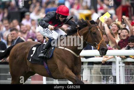 Royal Toast ridden by Cam Hardie leads the field home to win the Harwoods Group Stakes Race run during day two of the Bank Holiday Weekend at Goodwood Racecourse. Stock Photo