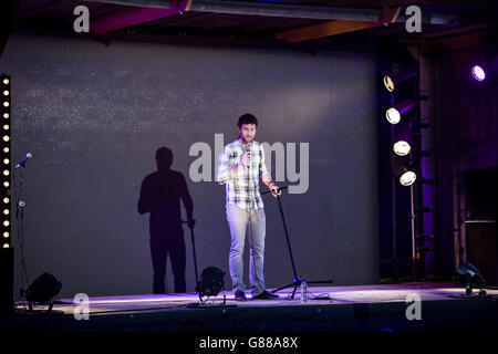 Comedian Andrew Bird performs during an evening of comedy at Banksy's ...