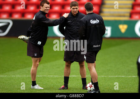 Liverpool's John Arne Riise, Steven Gerrard and Jamie Carragher during the training session Stock Photo