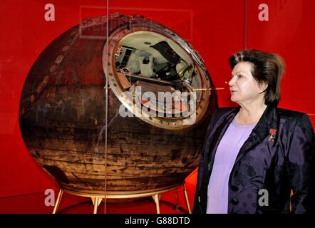 Valentina Tereshkova, the first woman in space, stands in front of Vostok-6, the capsule that she piloted into space, during the press preview of the Science Museum in London's new Cosmonauts: Birth of the Space Age exhibition. Stock Photo