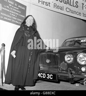 Sister Mary St Aphic, Sister Superior of the Covent of the Presentation of Our Lady Exeter, with Mark X Jaguar she won in a cookery competition. The presentation was made at Hotelympia, the Hotels and Catering Exhibition in Olympia, London. Stock Photo