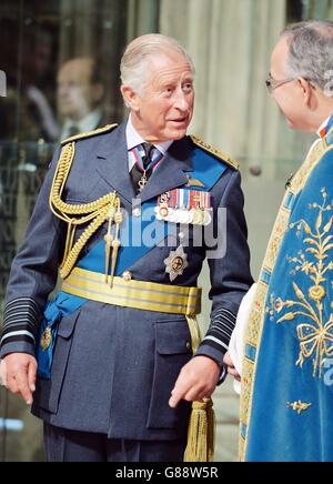 The Prince of Wales talks to the Dean of Westminster Abbey Dr John Hall, at Westminster Abbey in central London before a service to mark the 75th anniversary for the Battle of Britain. Stock Photo