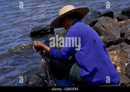 octopus fisherwoman, Anse Baleine, Rodrigues Stock Photo