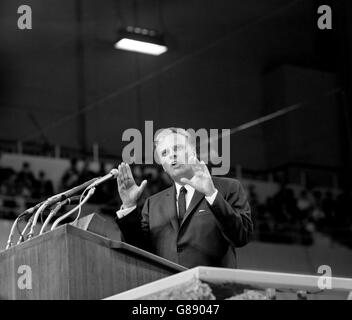 Dr Billy Graham, the American evangelist, addressing thousands of worshippers in the Earls Court exhibition hall in London. Stock Photo