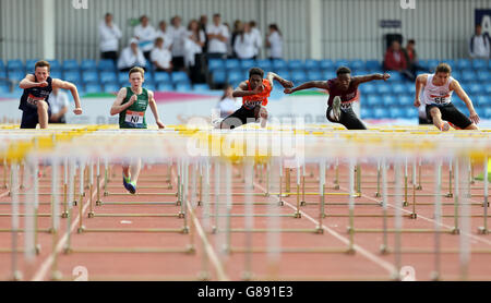 Sport - Sainsbury's 2015 School Games - Day Two - Manchester. Athletes participate in the boys 100m hurdles at the Sainsbury's 2015 School Games at the Manchester Regional Arena. Stock Photo