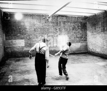 A covered exercise yard in the reconstructed maximum security wing of Parkhurst Prison, the isolated fortress on the Isle of Wight where up to 20 top risk prisoners will be kept. The exercise yard features transparent roofing and remote-controlled TV cameras, seen in the top left of the picture. Stock Photo