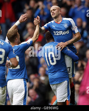 Rangers' Nicky Law celebrates scoring his side's third goal of the game with teammates during the Ladbrokes Scottish Championship match at Ibrox, Glasgow. PRESS ASSOCIATION Photo. Picture date: Saturday September 12, 2015. See PA story SOCCER Rangers. Photo credit should read: Danny Lawson/PA Wire. Stock Photo