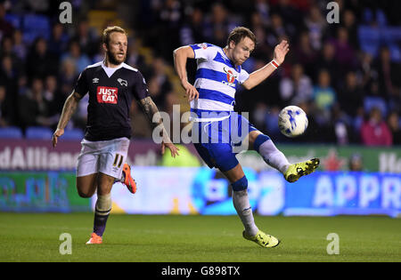 Reading's Chris Gunter (right) has a shot on goal during the Sky Bet Championship match at the Madejski Stadium, Reading. PRESS ASSOCIATION Photo. Picture date: Tuesday September 15, 2015. See PA story SOCCER Reading. Photo credit should read: Andrew Matthews/PA Wire. No use with unauthorised audio, video, data, fixture lists, club/league logos or 'live' services. Online in-match use limited to 45 images, no video emulation. No use in betting, games or single club/league/player publications. Stock Photo