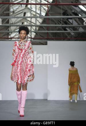 Models on the catwalk during the Ryan Lo Spring/Summer 2016 London Fashion Week show at BFC Show Space, Brewer Street car park in London. Stock Photo