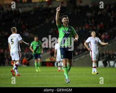 Southampton's Shane Long celebrates scoring his team's sixth goal of the game during the Capital One Cup, third round match at Stadium:MK, Milton Keynes. Stock Photo