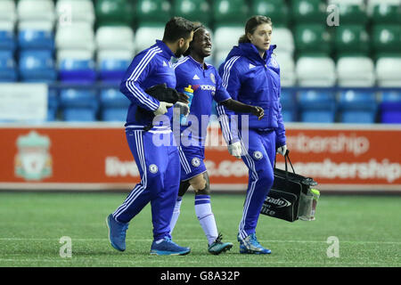 Chelsea's Eniola Aluko is substituted with an injury during the Women's Super League match at the Select Security Stadium, Widnes. Stock Photo