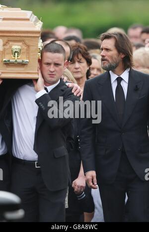 Jim Carrey joins mourners behind the coffin of ex-girlfriend Cathriona White to Our Lady of Fatima Church, in her home village of Cappawhite, Co Tipperary ahead of her funeral. Stock Photo