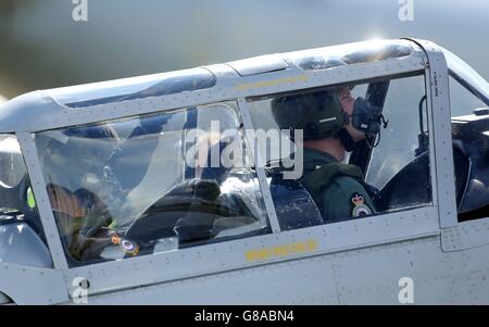 The Duke of Cambridge in the cockpit of a Chipmunk plane with pilot Squadron Leader Duncan Mason during a visit to RAF Coningsby, Lincolnshire. Stock Photo