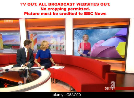 TV OUT. ALL BROADCAST WEBSITES OUT. No cropping permitted. Picture must be credited to BBC News. We are advised that videograbs should not be used more than 48 hours after the time of original transmission, without the consent of the copyright holder. Video grab taken from BBC News of BBC Breakfast presenters Charlie Stayt and Louise Minchin and weather presenter Carol Kirkwood, as a fashion clash was on the cards with BBC Breakfast's Carol Kirkwood and Louise Minchin appearing on TV wearing the same dress. Stock Photo