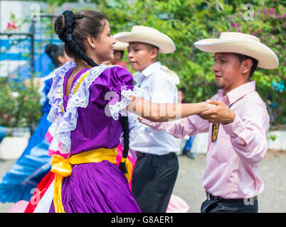 Salvadoran dancers perform during the Flower & Palm Festival in Panchimalco, El Salvador Stock Photo
