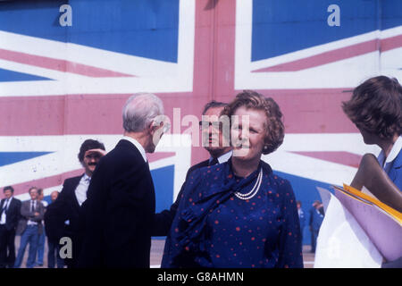 Prime Minister Margaret during her visit to the British Hovercraft Corporation Ltd, based in East Cowes. The flag painted on a hangar door is claimed to be the largest of its kind in the world. The visit to the island marked the end of Mrs Thatcher's election campaign tour. Stock Photo