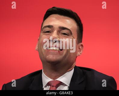 Shadow home secretary Andy Burnham sits on stage on the final day of the Labour Party annual conference at the Brighton Centre in Brighton, Sussex. Stock Photo